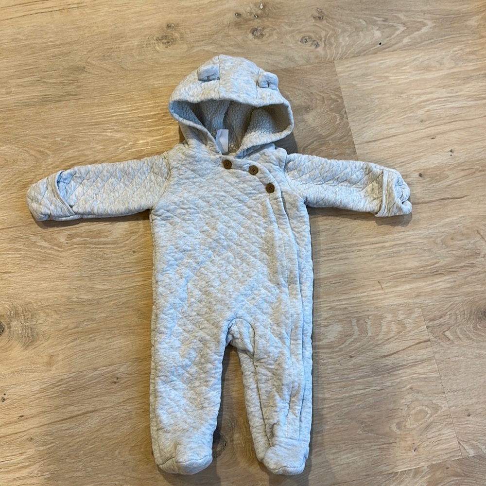 Quilted sweater baby bunting